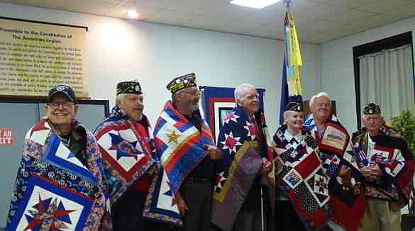 On Saturday, members of the Lincoln Quilters Guild presented Quilts of Valor to seven veterans in a program at the American Legion.&nbsp; Jean Funderburk is the president and Elsie Oakes vice-president of the Guild; Cathy Loughlin was in charge of the Quilts of Valor program.&nbsp;&nbsp;