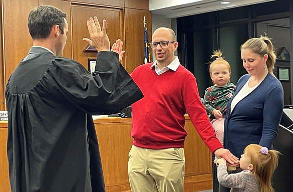 Cole Setzer is sworn in as Catawba County Commissioner.