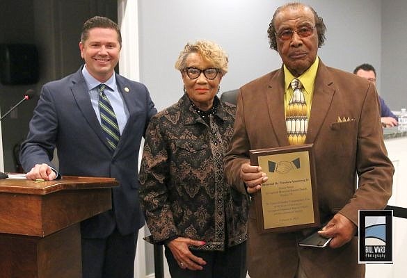 <span style="font-size: small;"><strong>Rev. and Mrs. Theodore Armstrong <br />hold the proclamation honoring him <br />for his decades of service to Springfield <br />Memorial Baptist Church in Stanley.&nbsp;</strong></span>