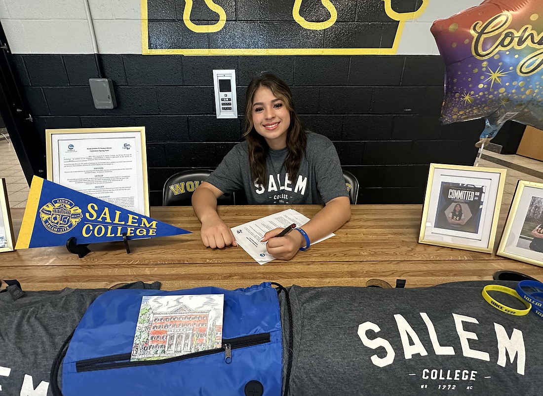 Vanessa Cespedes signing her National Letter of Intent to play soccer at Salem College.