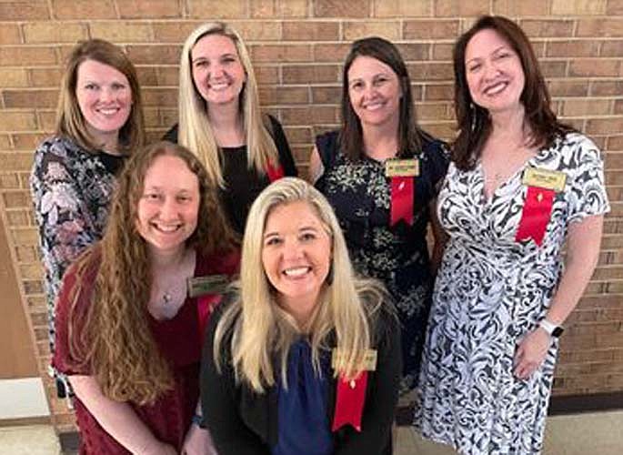 Newly inducted Delta Sigma members are Dr. Laurie Dymes, Rachel Frye, Jennifer Queen, Shannon Ramsey, Erica Roberson, and Alysha Tench.