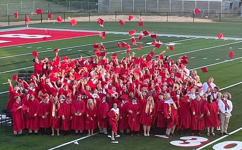 At West Lincoln High School’s stadium, graduates toss their mortarboards high into the air during last year’s commencement ceremonies. This year’s event will be held on Friday, May 24, at 7 p.m.